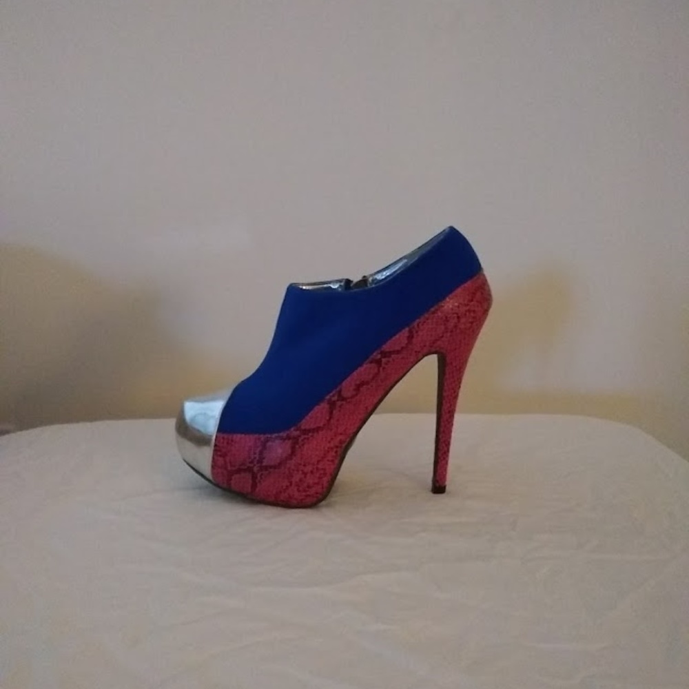 Stilletto platform heels. Height - 5 1/2 inches.